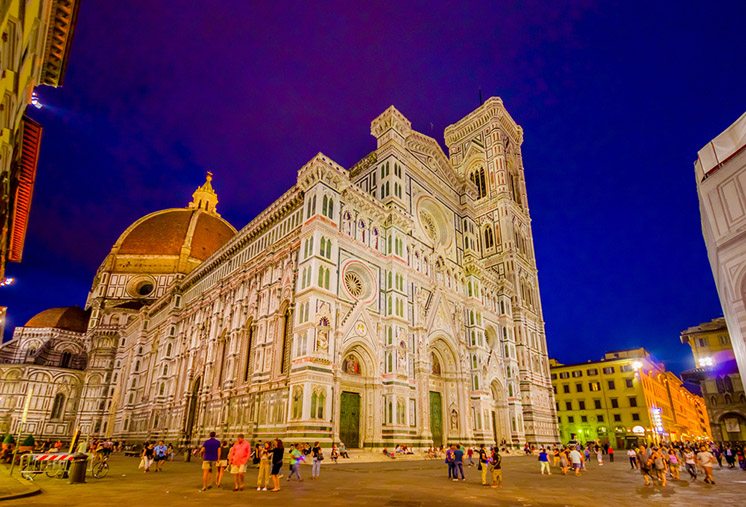 FLORENCE, ITALY - JUNE 12, 2015: Sunset in front of Florence Cathedral, blue sky contrasts and luminated building
