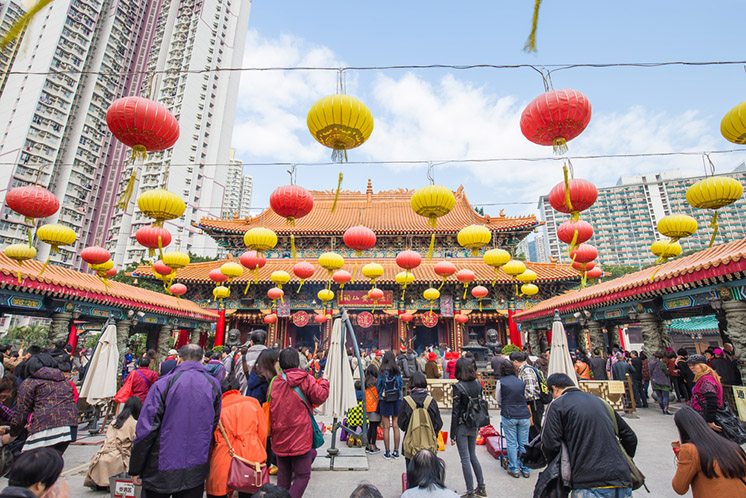 HONG KONG - DECEMBER 21, 2014: Crowded day at Sik Sik Yuen Wong