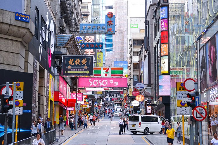 HONG KONG - JUN 12: Central District: Traffic and city life in A