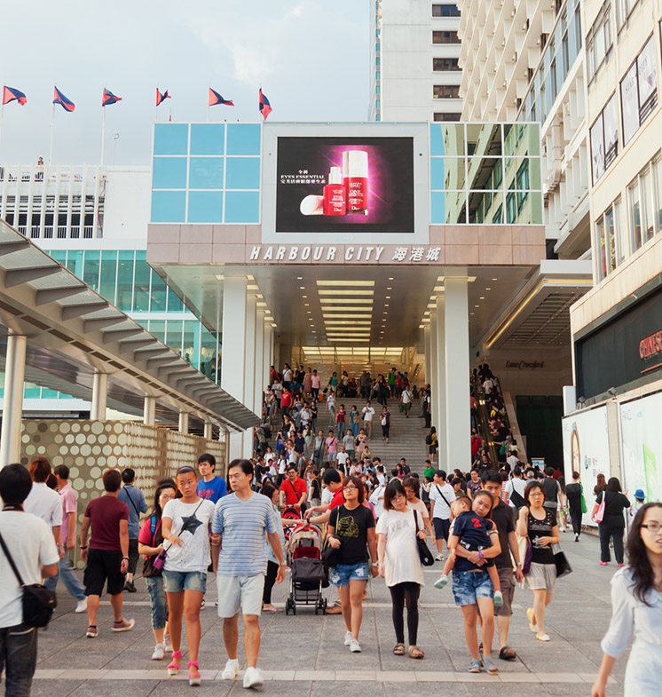 Shoppers outside Harbour City, a shopping mall in Hong Kong