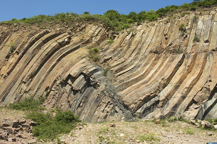 Bent hexagonal columns at the Hong Kong Global Geopark, China.