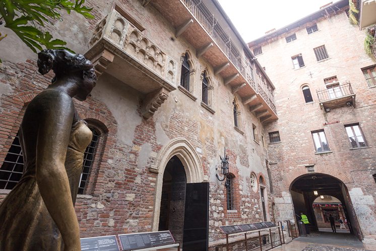 Juliet's balcony and Juliet statue - Verona - Italy
