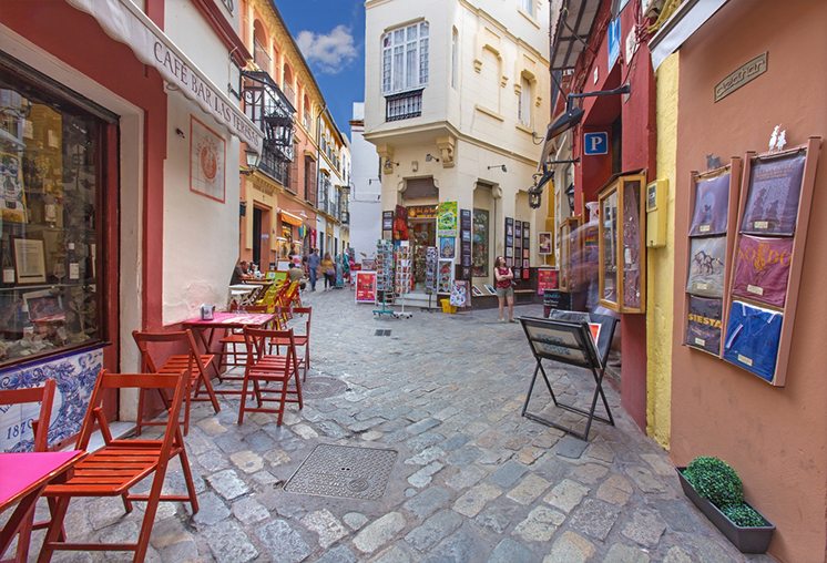 SEVILLE, SPAIN - OCTOBER 28, 2014: Little streets with the shops