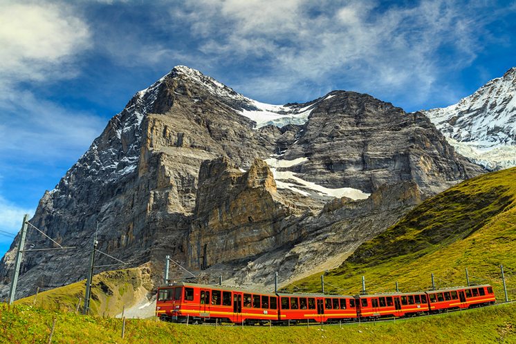 Electric tourist train and Eiger North face,Bernese Oberland,Swi
