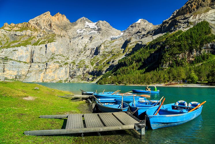 Wonderful alpine lake with high mountains and glaciers,Oeschinen