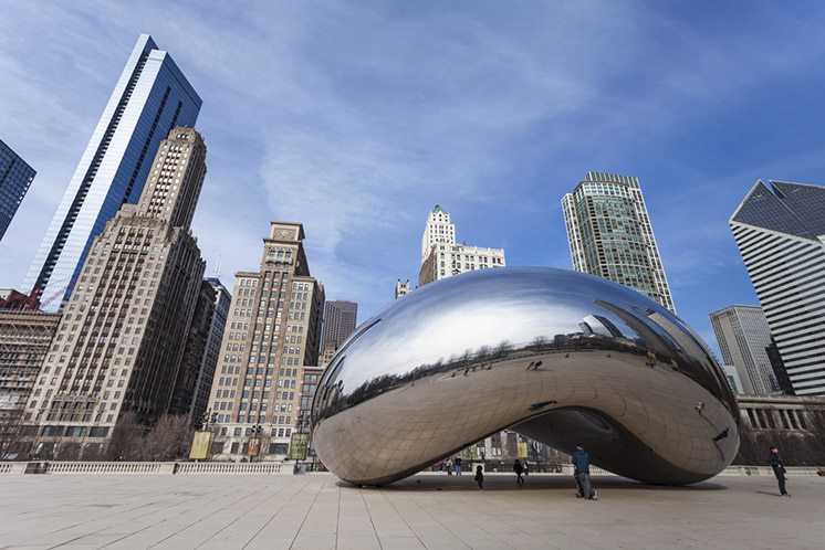 CHICAGO, USA - APRIL 02: Cloud Gate and Chicago skyline on April