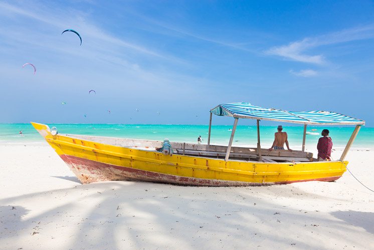 White tropical sandy beach on Zanzibar.