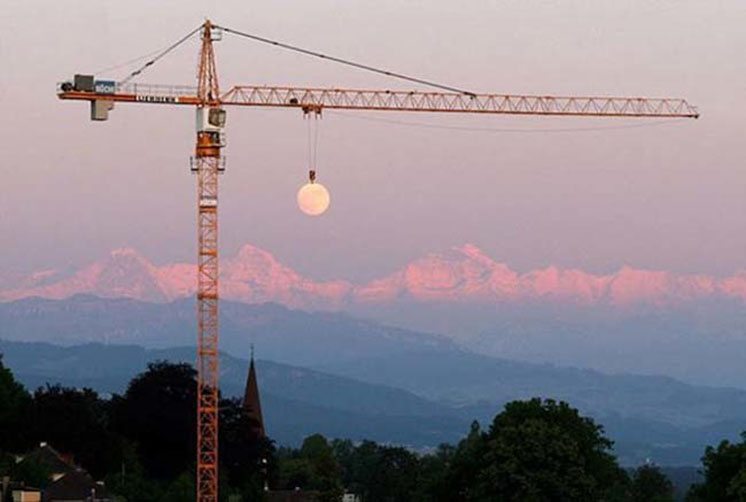 36-a-crane-lifting-the-moon