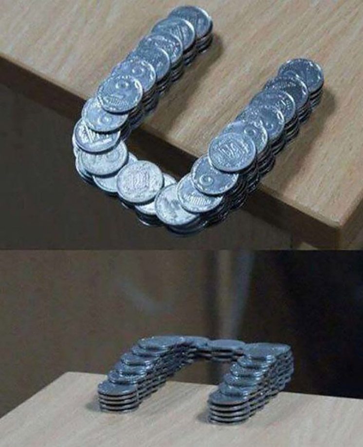 95-coins-stacked-past-tables-edge